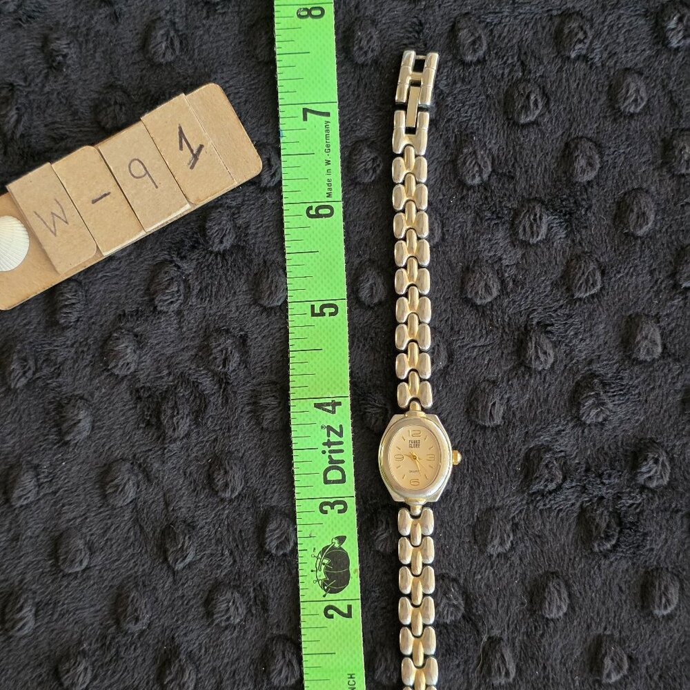 Item #W91 Faded Glory 7.5 in band .75in face Watch